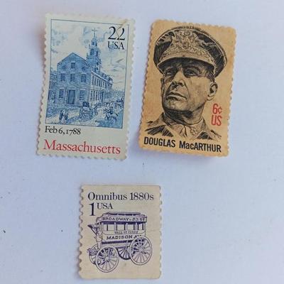 Three vintage postage stamps