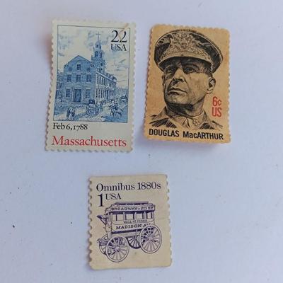 Three vintage postage stamps