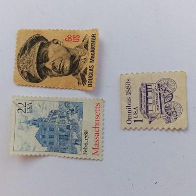 Three vintage postage stamps