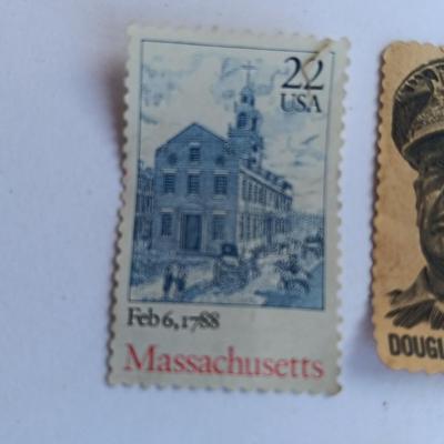 Three vintage postage stamps