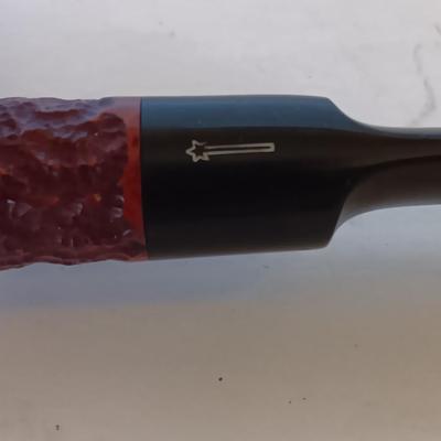 Jack Daniels belt buckle with two tobacco pipes and a fancy neck tie