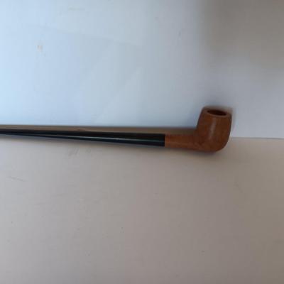 Jack Daniels belt buckle with two tobacco pipes and a fancy neck tie