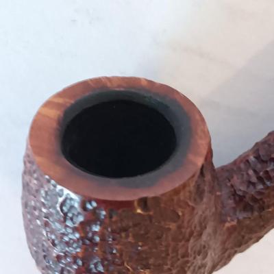 Jack Daniels belt buckle with two tobacco pipes and a fancy neck tie