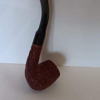 Jack Daniels belt buckle with two tobacco pipes and a fancy neck tie