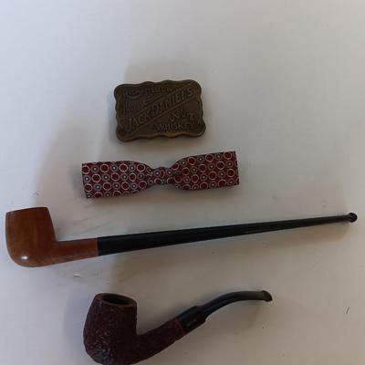 Jack Daniels belt buckle with two tobacco pipes and a fancy neck tie