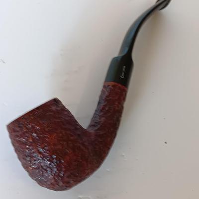 Jack Daniels belt buckle with two tobacco pipes and a fancy neck tie