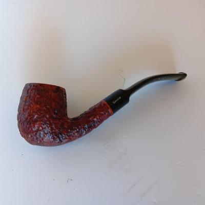 Jack Daniels belt buckle with two tobacco pipes and a fancy neck tie