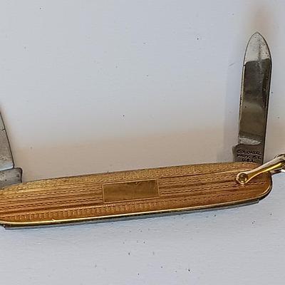 Men's Jewelry - gold toned knife, cuff links, and more