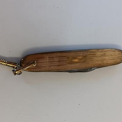 Men's Jewelry - gold toned knife, cuff links, and more