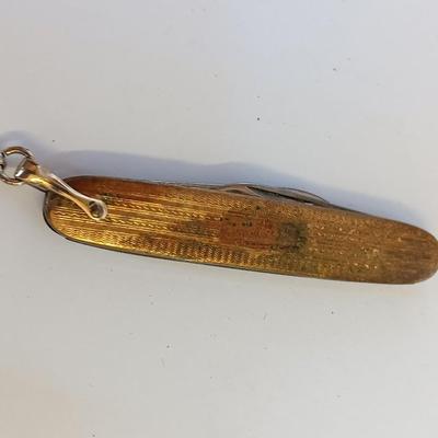 Men's Jewelry - gold toned knife, cuff links, and more