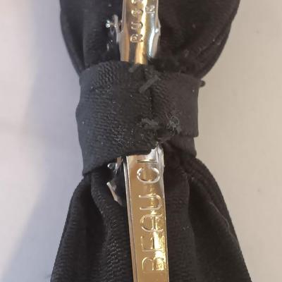 Bow ties with bolo tie and tie pins