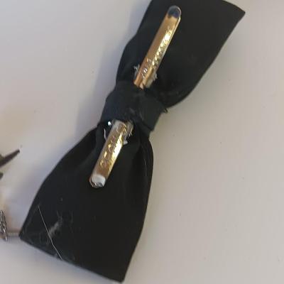 Bow ties with bolo tie and tie pins