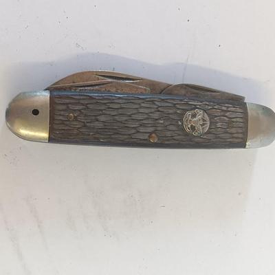 Vintage scout knife with vintage brooch and cuff links