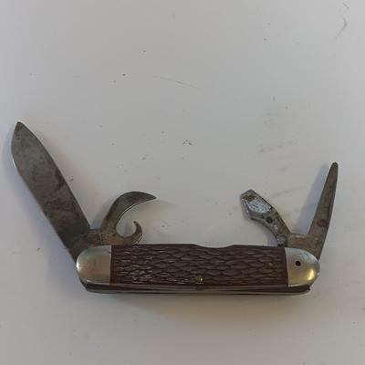 Vintage scout knife with vintage brooch and cuff links