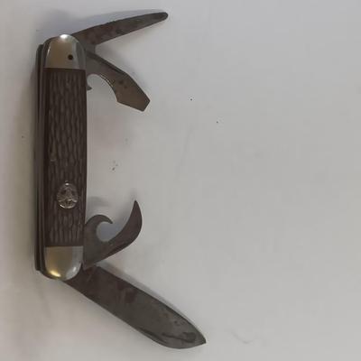 Vintage scout knife with vintage brooch and cuff links