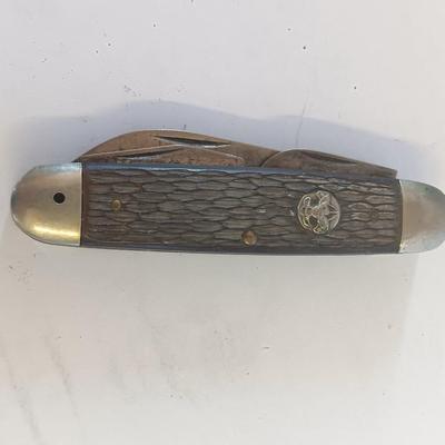 Vintage scout knife with vintage brooch and cuff links