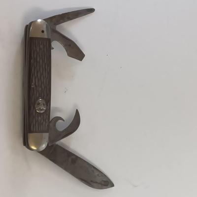 Vintage scout knife with vintage brooch and cuff links