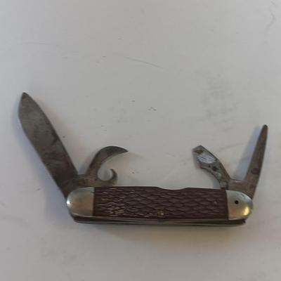 Vintage scout knife with vintage brooch and cuff links