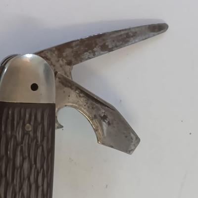 Vintage scout knife with vintage brooch and cuff links