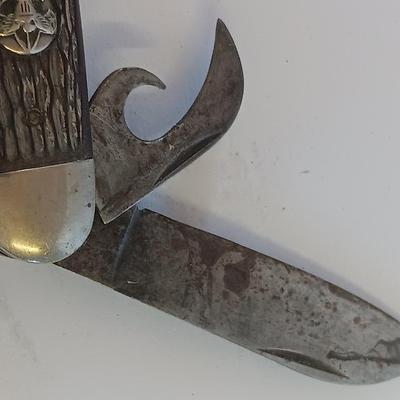 Vintage scout knife with vintage brooch and cuff links