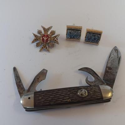 Vintage scout knife with vintage brooch and cuff links
