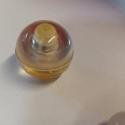 Women's "Junk drawer" lot Collectible beauty and perfume items