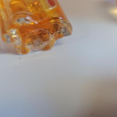 Women's "Junk drawer" lot Collectible beauty and perfume items