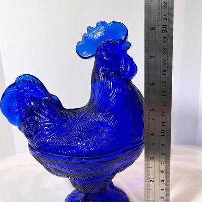 Cobalt blue hen on nest