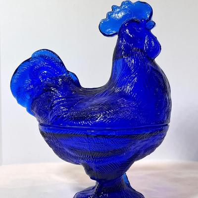 Cobalt blue hen on nest