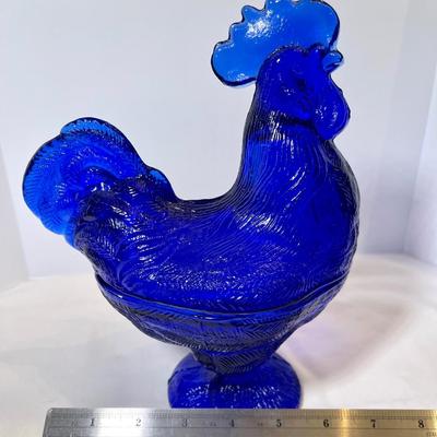 Cobalt blue hen on nest