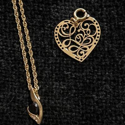 Gold tone necklaces, charms & rings