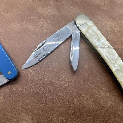 Two vintage Coca Cola Knives
