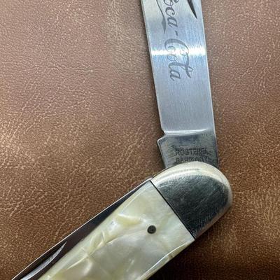 Two vintage Coca Cola Knives