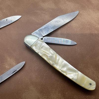 Two vintage Coca Cola Knives