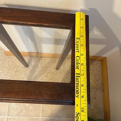 Small glass top wooden table