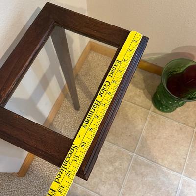 Small glass top wooden table