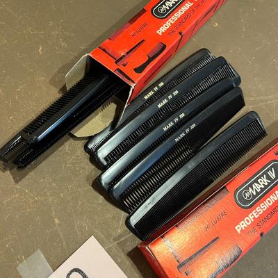 2 boxes full of new professional combs