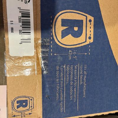 New in box toilet seat