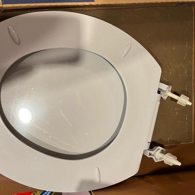 New in box toilet seat