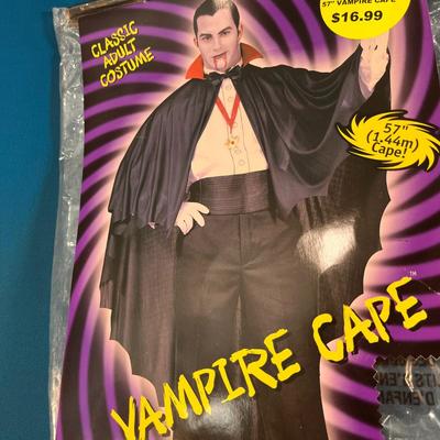 NEW IN PKG. ADULT SIZE VAMPIRE CAPE WITH WHITE GLOVES