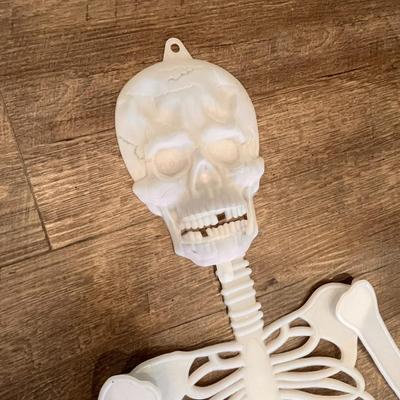 GLOW IN THE DARK PLASTIC SKELETON 64â€ TALL
