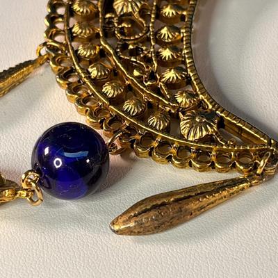 MYSTERIOUS DANGLY OPEN WORK MOON AND BLUE BEAD PIN