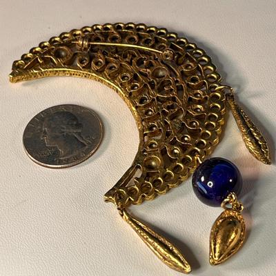 MYSTERIOUS DANGLY OPEN WORK MOON AND BLUE BEAD PIN