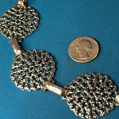 GROOVY SILVER TONE OPEN WORK MEDALLION BELT