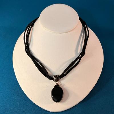 GOTHIC BLACK STONE PENDANT ON BLACK SUEDE CORDS AND FANCY BEAD
