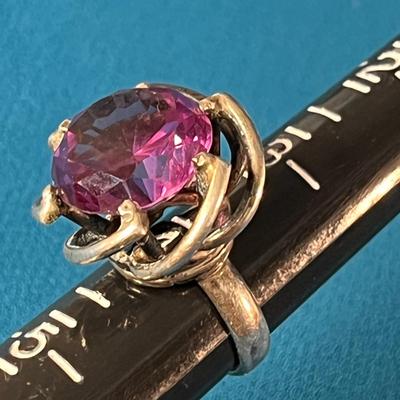 MYSTICAL FACETED GLASS STONE IN SWIRLED SILVER SETTING RING