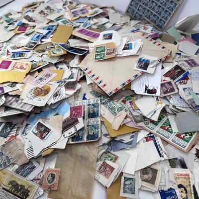 Huge pile of vintage stamps unsorted