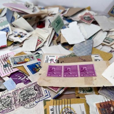 Huge pile of vintage stamps unsorted