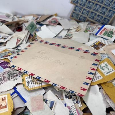 Huge pile of vintage stamps unsorted