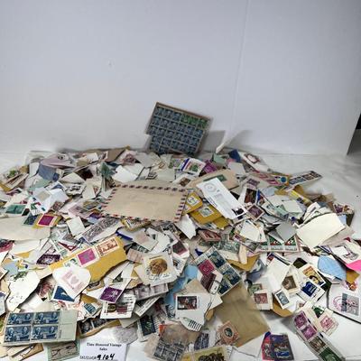 Huge pile of vintage stamps unsorted